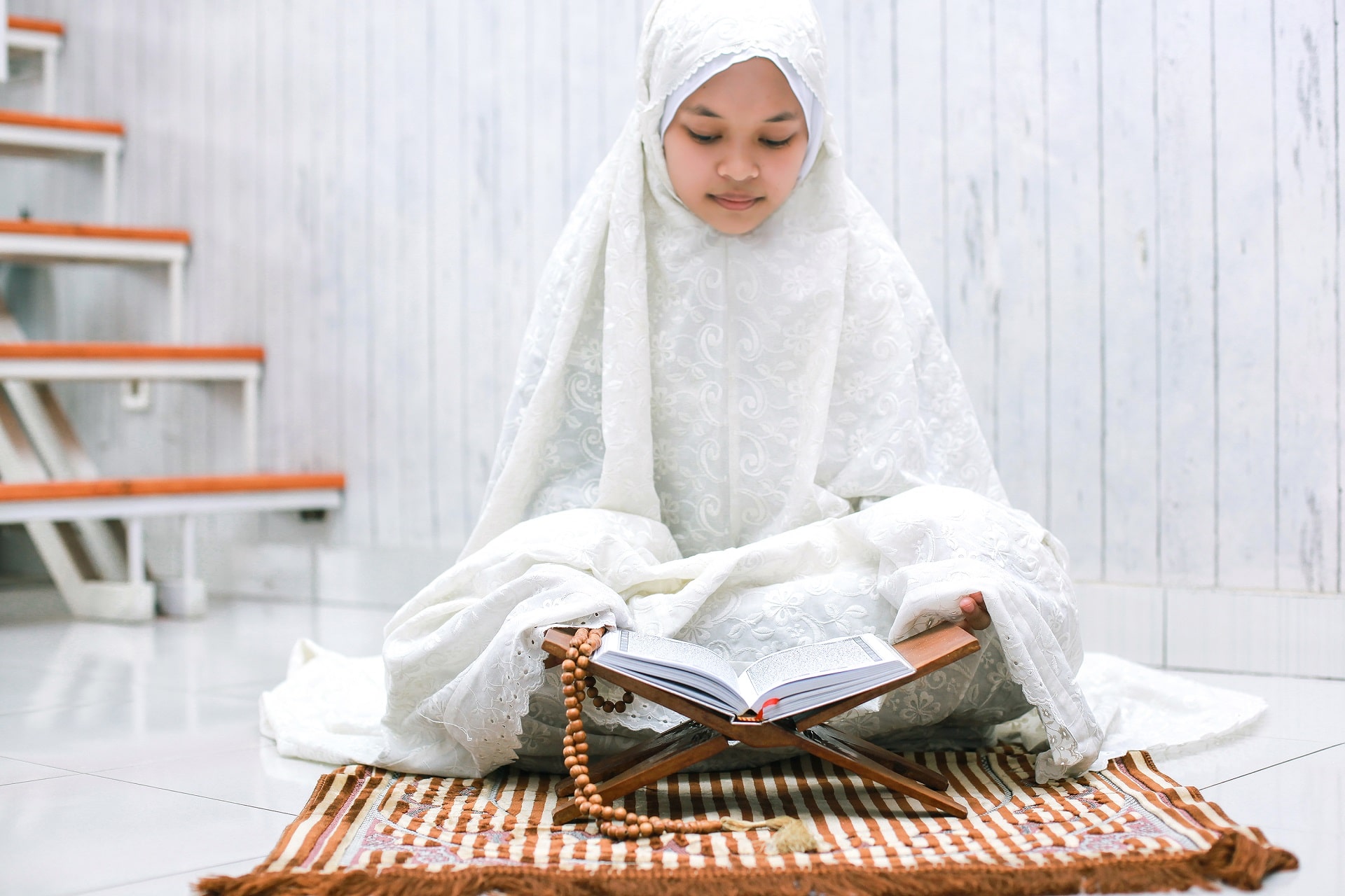 mulim-woman-reading-quran-2021-09-01-02-47-28-utc-min.jpg